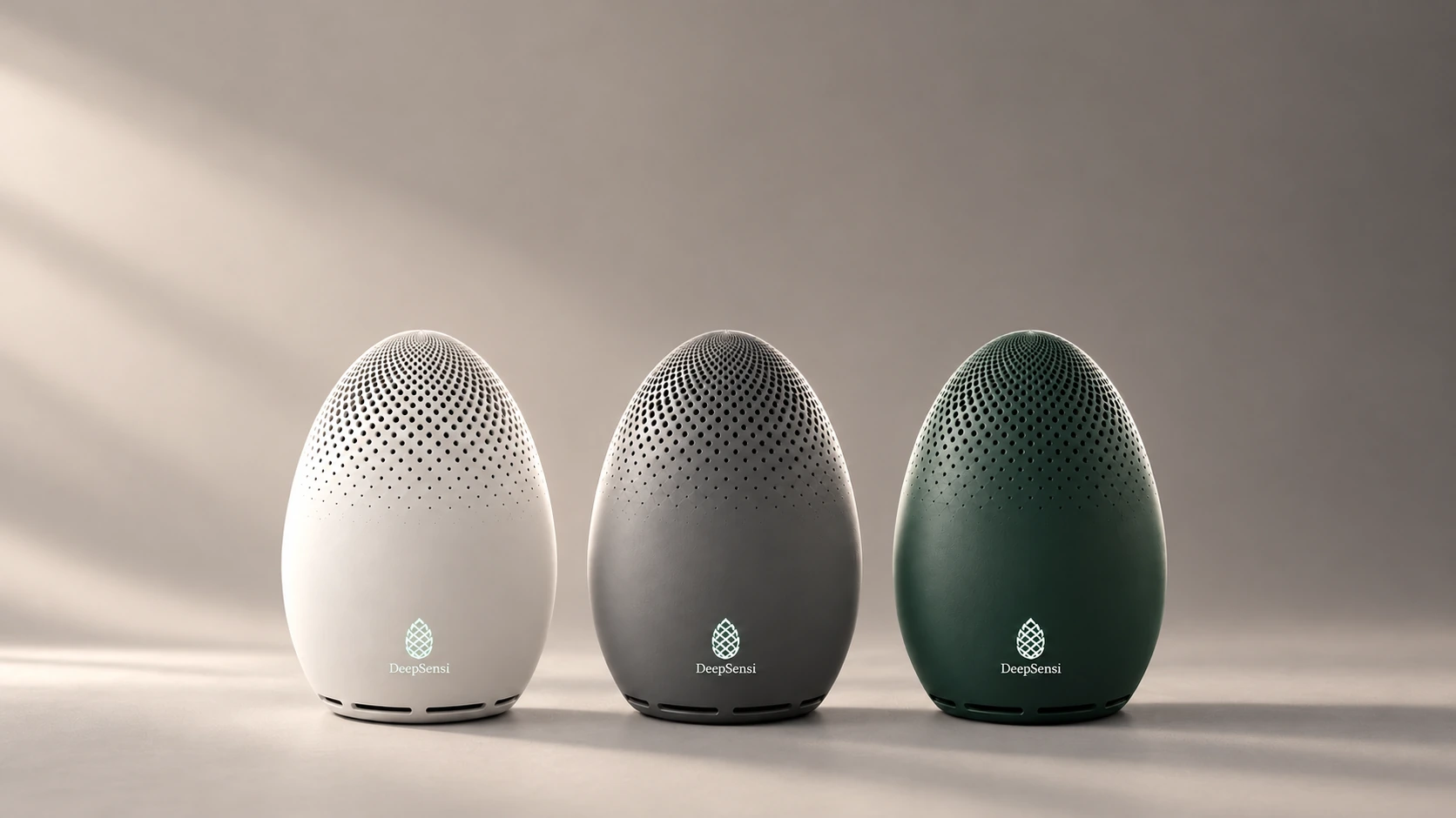 DeepSensi Edge Node fleet trio: Pearl White, Satin Gray, and Deep Forest Green in editorial side lighting.